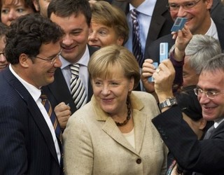 Germany Votes Yes, But Crisis Is Far From Over