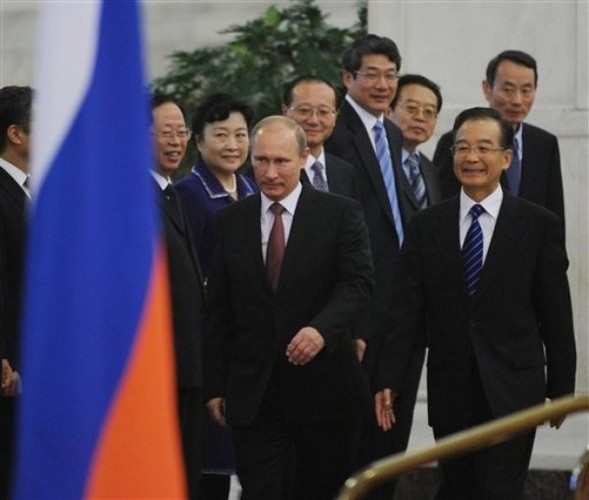 Putin's Shadow Looms Over World