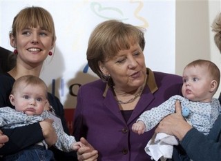 Fate of Capitalism Rests With Merkel, Obama