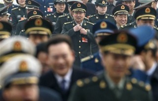 China Rushes to Fill America's Military Vacuum