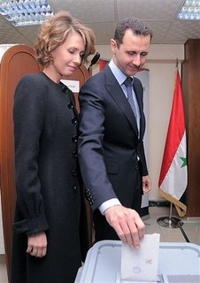 The Assads at War: Killing and Shopping