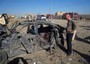 Iraq Bombings Kill Dozens