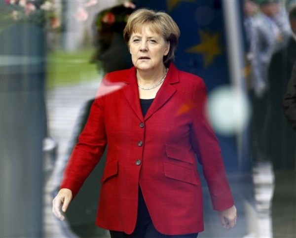 Germany's Choice: Inflation or Defaults