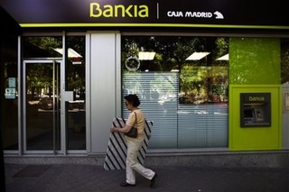 EU Smiled While Spain's Banks Cooked the Books