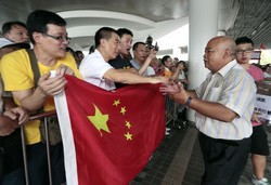 Chinese Activists Return Amid Japan