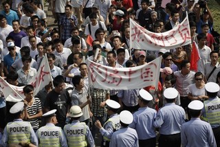 Asian Nations Should Beware of the 'Riot' in Patriotism