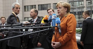 Why Merkel's Dragging Her Feet