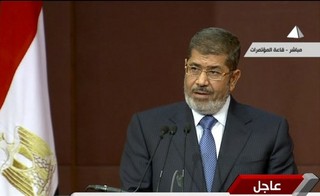 Why Won't Morsi Back Down? Read His Resume