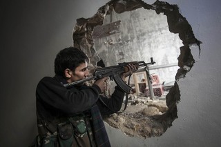 Back the Syrian Rebels, But Don't Intervene