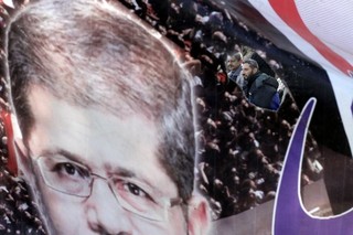 Morsi Emerges from Vote Weaker