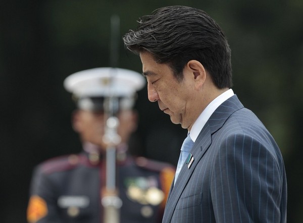 Why Shinzo Abe Won't Turn Hawk
