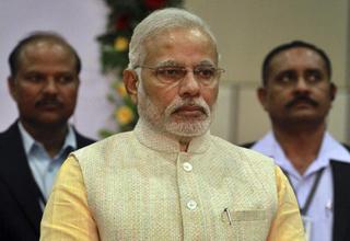 Modi: Can India's Strongman Bring Prosperity?