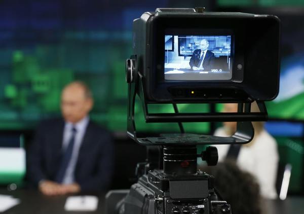 Russia's RT: Is It More BBC or KGB?