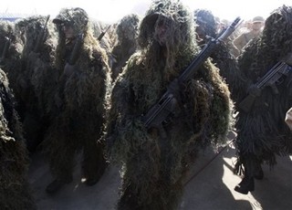 U.S. and Iran Battle in Iraq