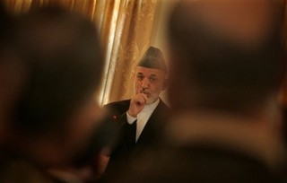 Taliban, Karzai Hold Secret Talks to End War