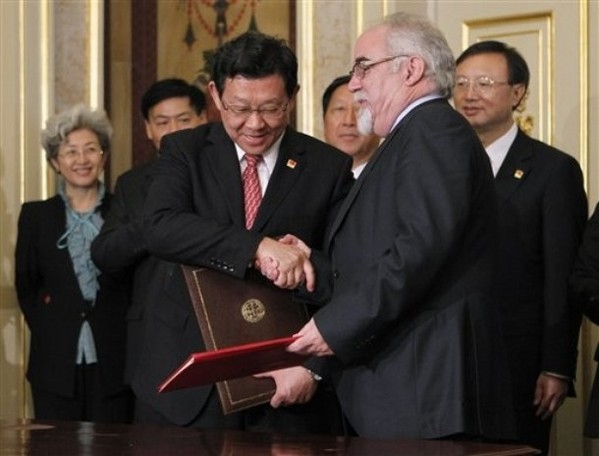 China Smiles at Obama's Setback