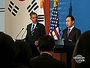 Obama Battles Dire Economy On Two Fronts