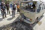 Scores Killed in Two Iraq Cities