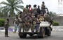 French APCs Rolling Through Abidjan