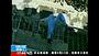 Beijing Man Rescued After Dangling From Highrise